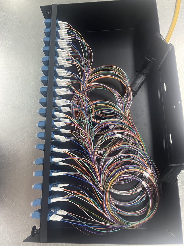 144 fiber SM QXXI LC 50meter i SysM Leverandørmontert i 2U SysM-panel 